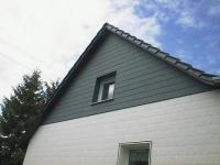 Fassadenverkleidung Zierer Schiefer und VinyStone Quader